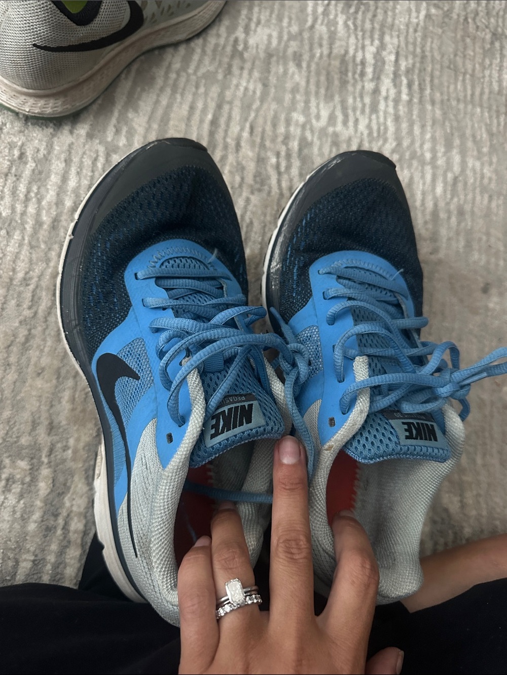 Nike women’s Blue and Navy Lace-Up Running Sneakers